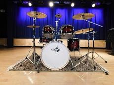 Drumset situated on a stage